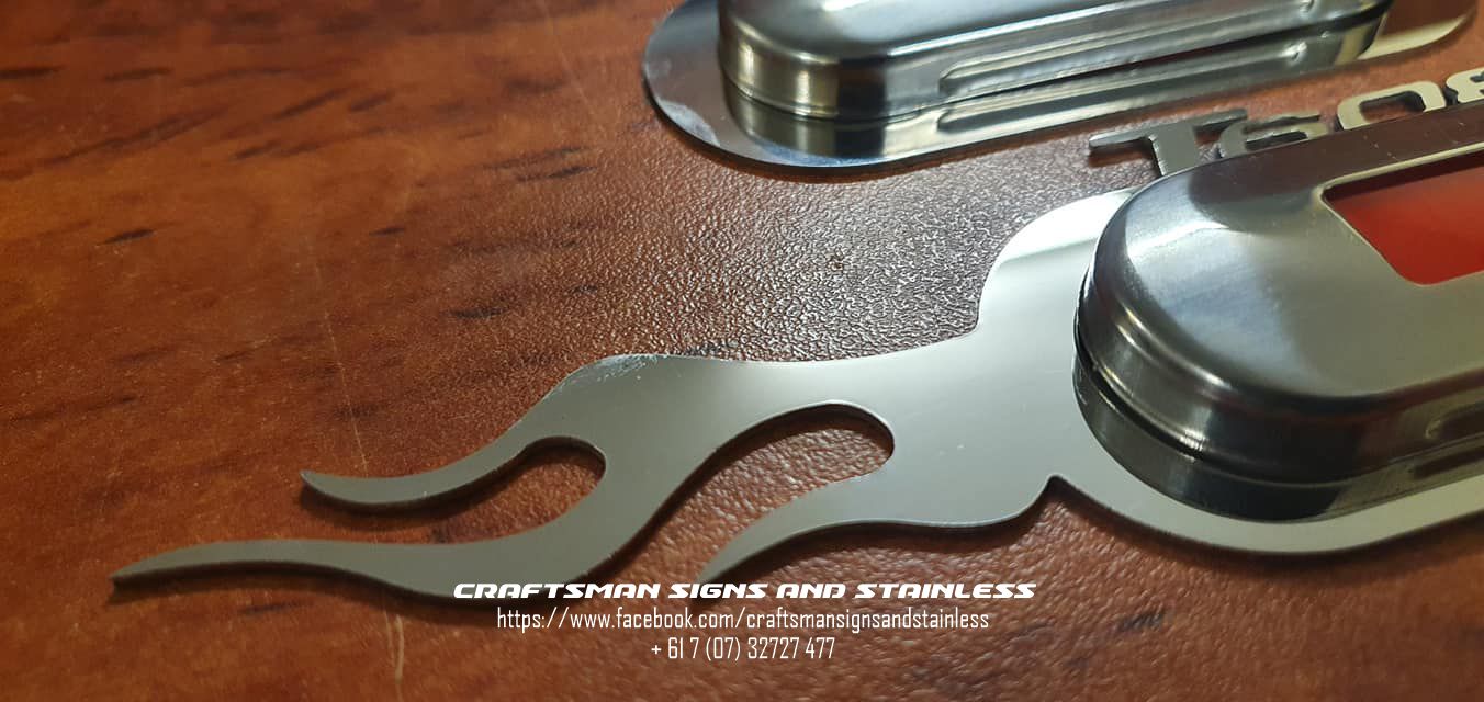 Stainless Steel courtesy light surrounds for a Kenworth K200