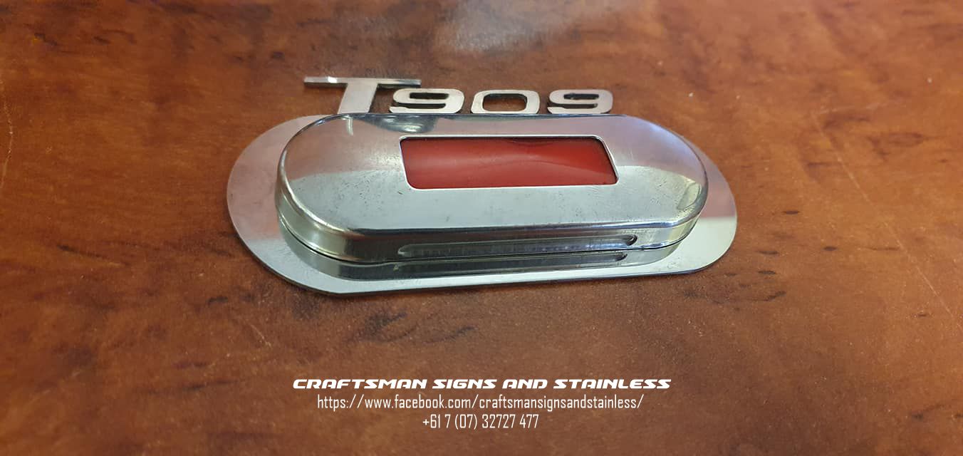 Stainless Steel courtesy light surrounds for a Kenworth K200