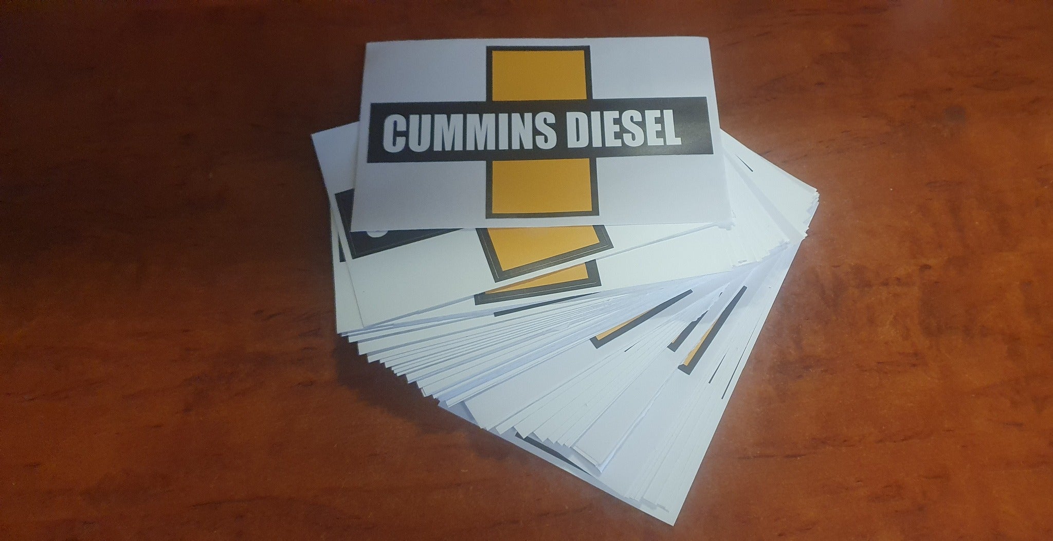Decal, CUMMINS DIESEL vintage black on yellow cut vinyl