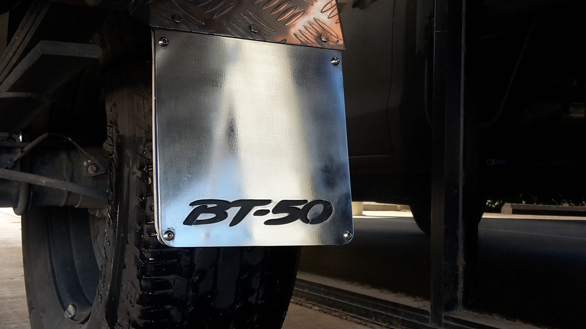 Stainless steel mudflap counterweights MAZDA BT50