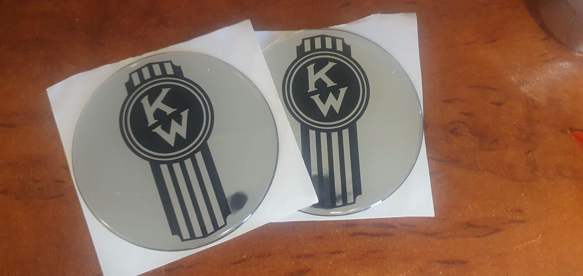 Round EPOXY DOMED DECALS crooked KENWORTH BLACK on Chrome