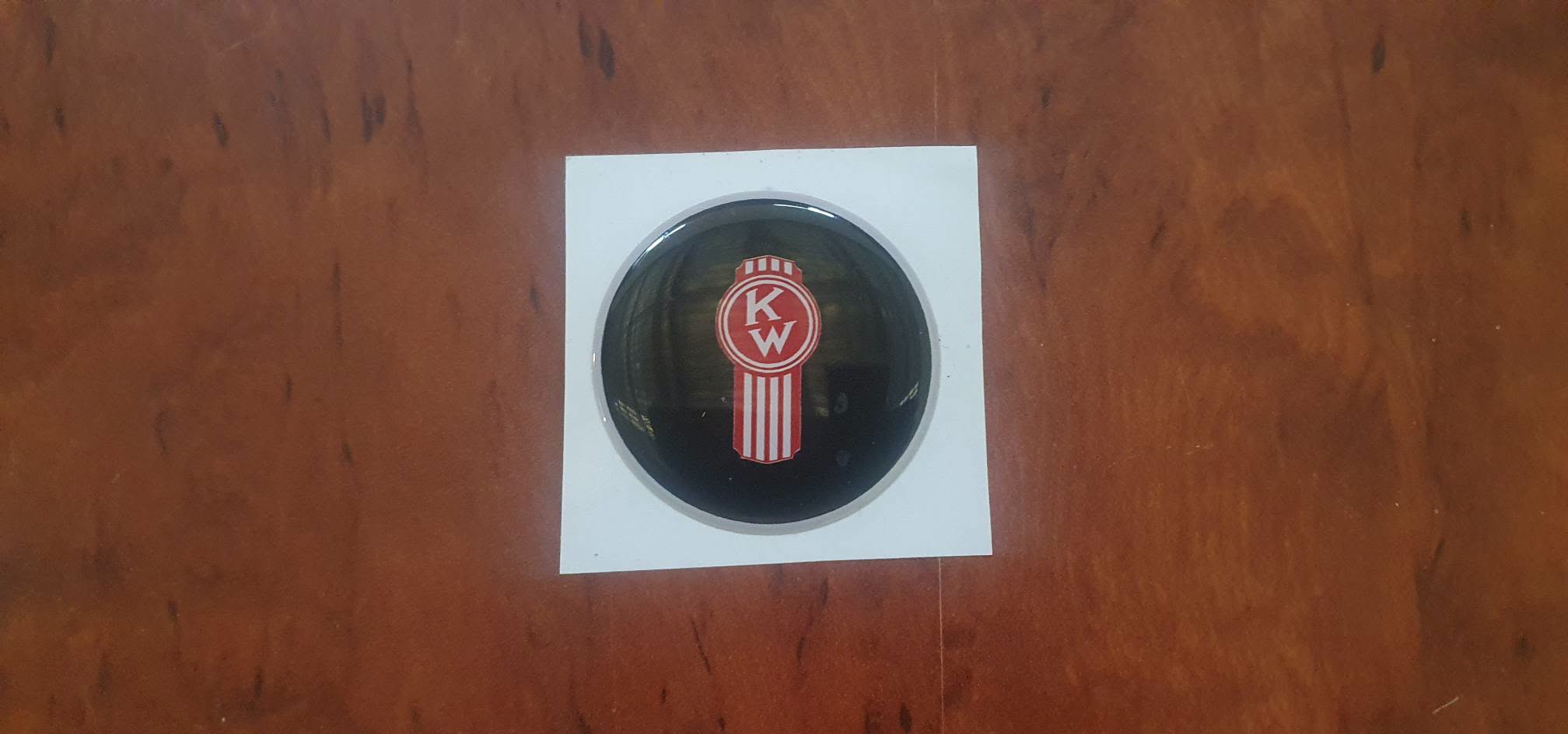 KENWORTH  'Smartwheel' epoxy domed horn button 'skin' red and white 'crooked' on black