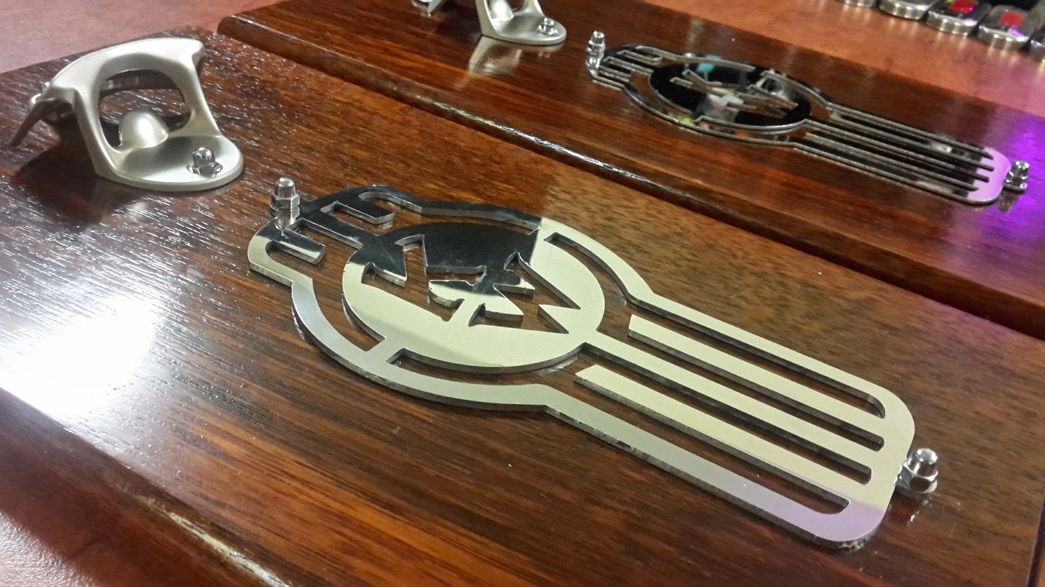Stainless Steel Kenworth Badges w/mounting holes ('Crooked')