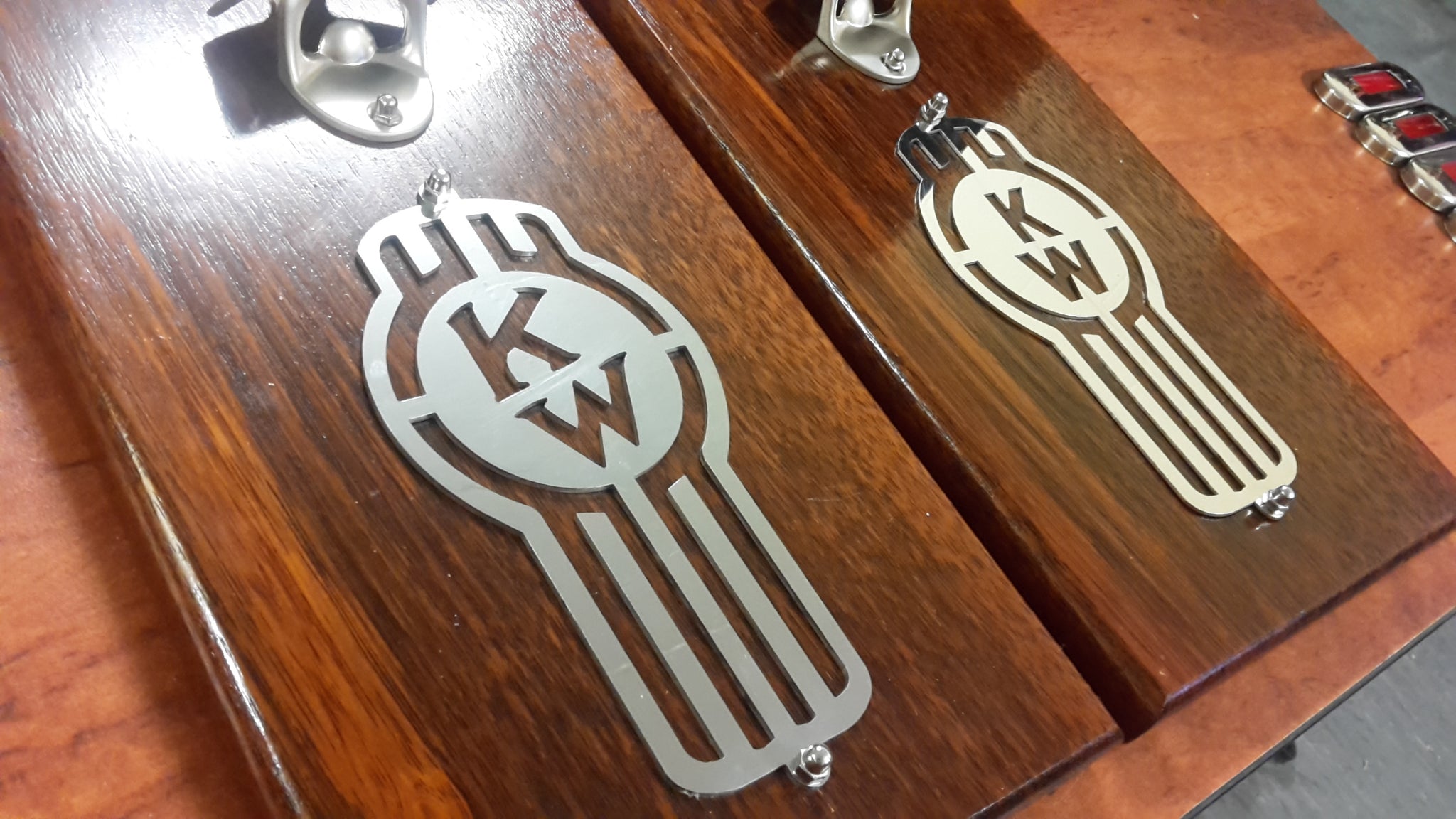 Stainless Steel Kenworth Badges w/mounting holes ('Crooked')