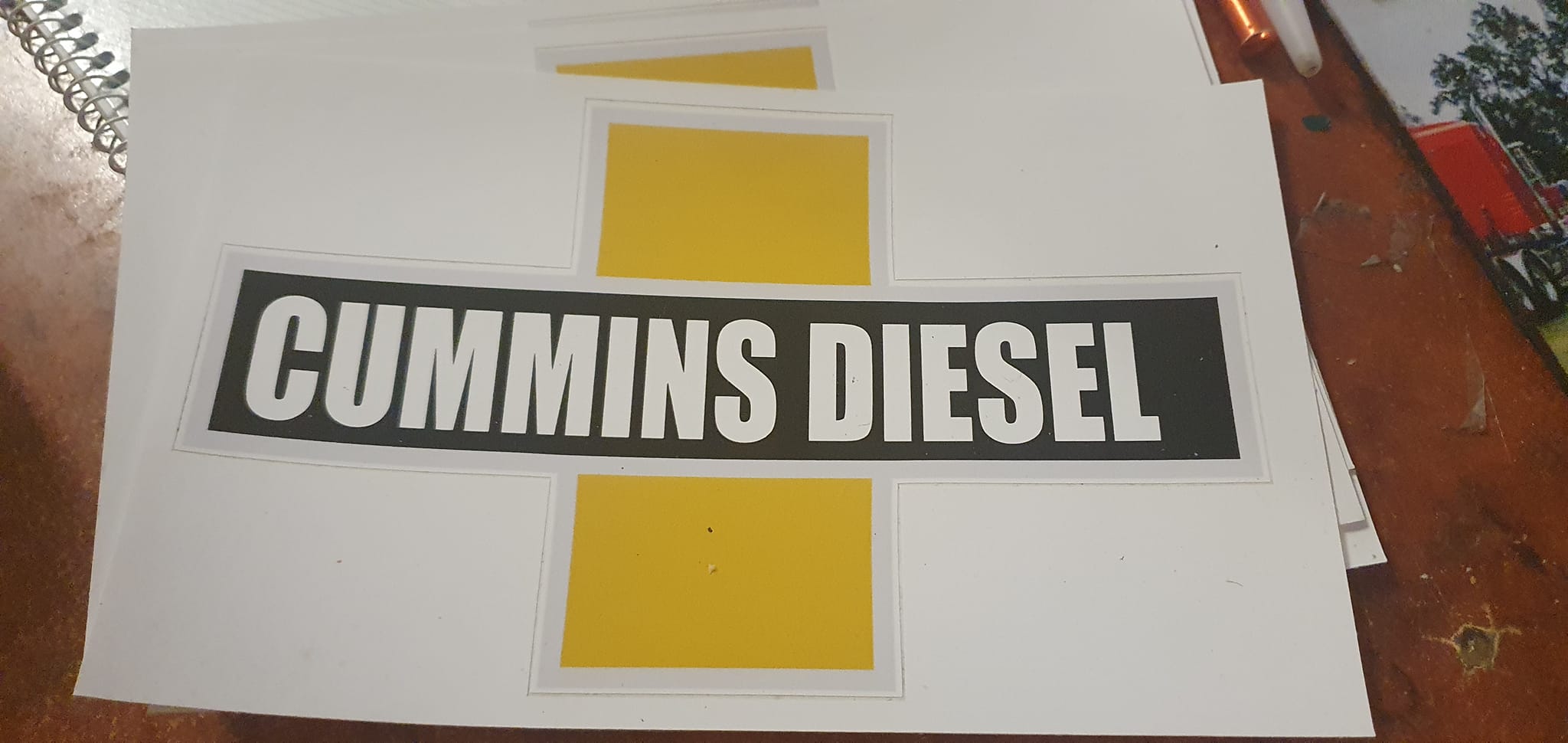 Decal, CUMMINS DIESEL yellow on silver/chrome cut vinyl