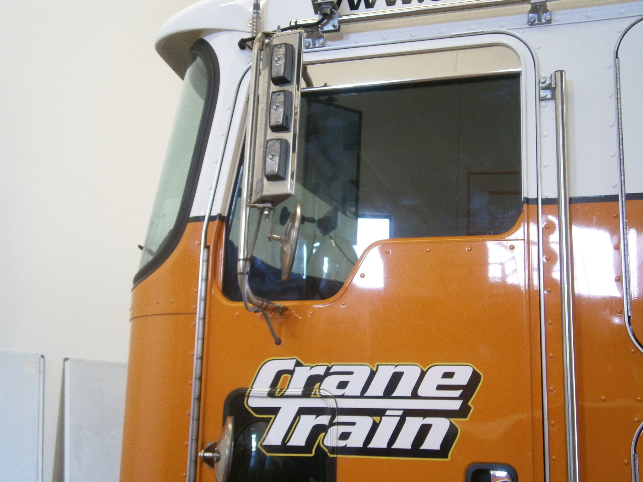 S/S widow visors (chop tops) for Kenworth K200 RHS